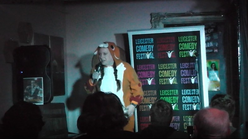Woman on stage dressed as a kangaroo
